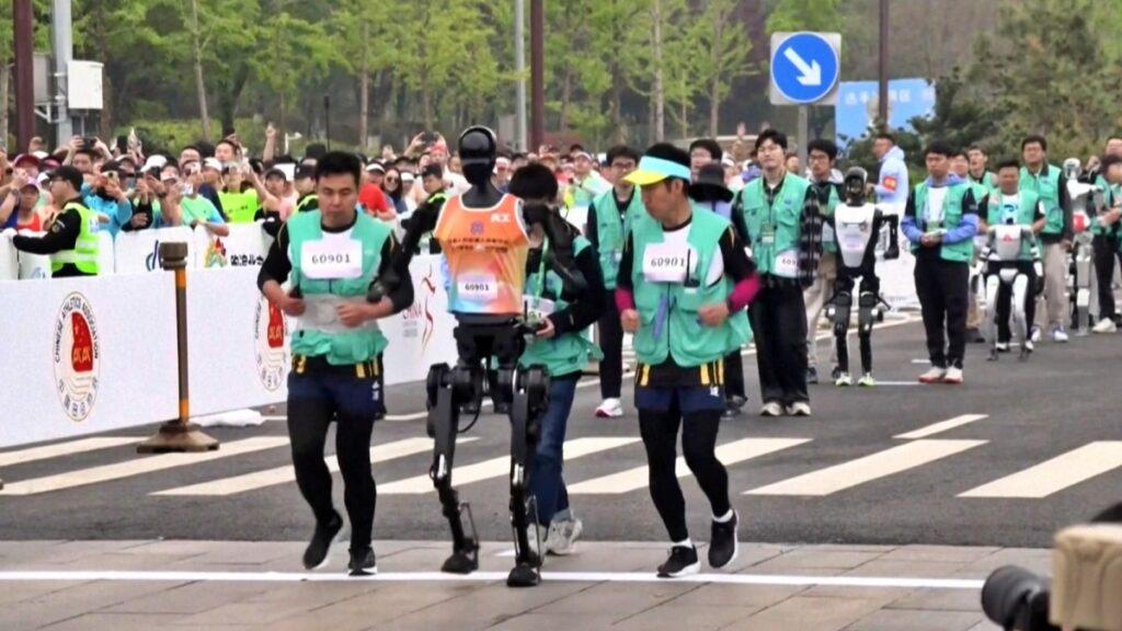 World First Half Marathon For Humanoid Robot And Human
