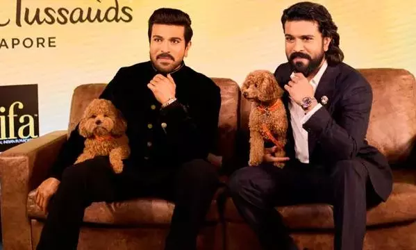 Ram Charan Wax Statue With Dog Rhyme Unveiled In London